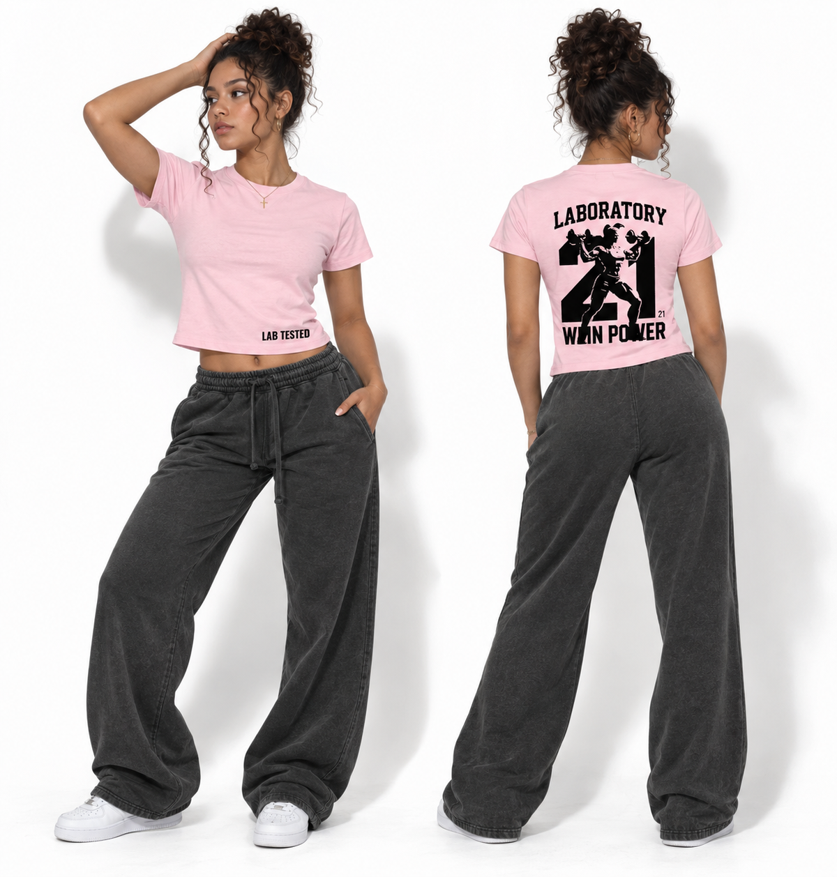 A model shown from the front and back wearing a light pink short-sleeve crop top and dark gray wide-leg sweatpants against a white studio background.