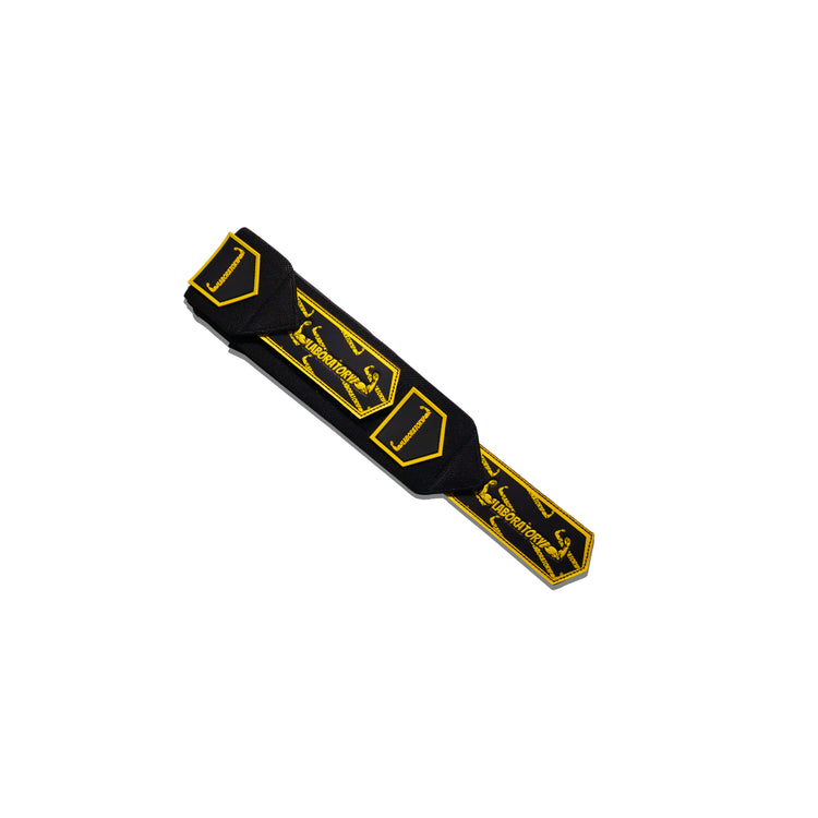 Black and yellow wrist wrap with branding on a white background