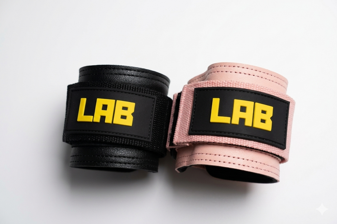 Black and pink wrist wraps with 'LAB' branding on a white background