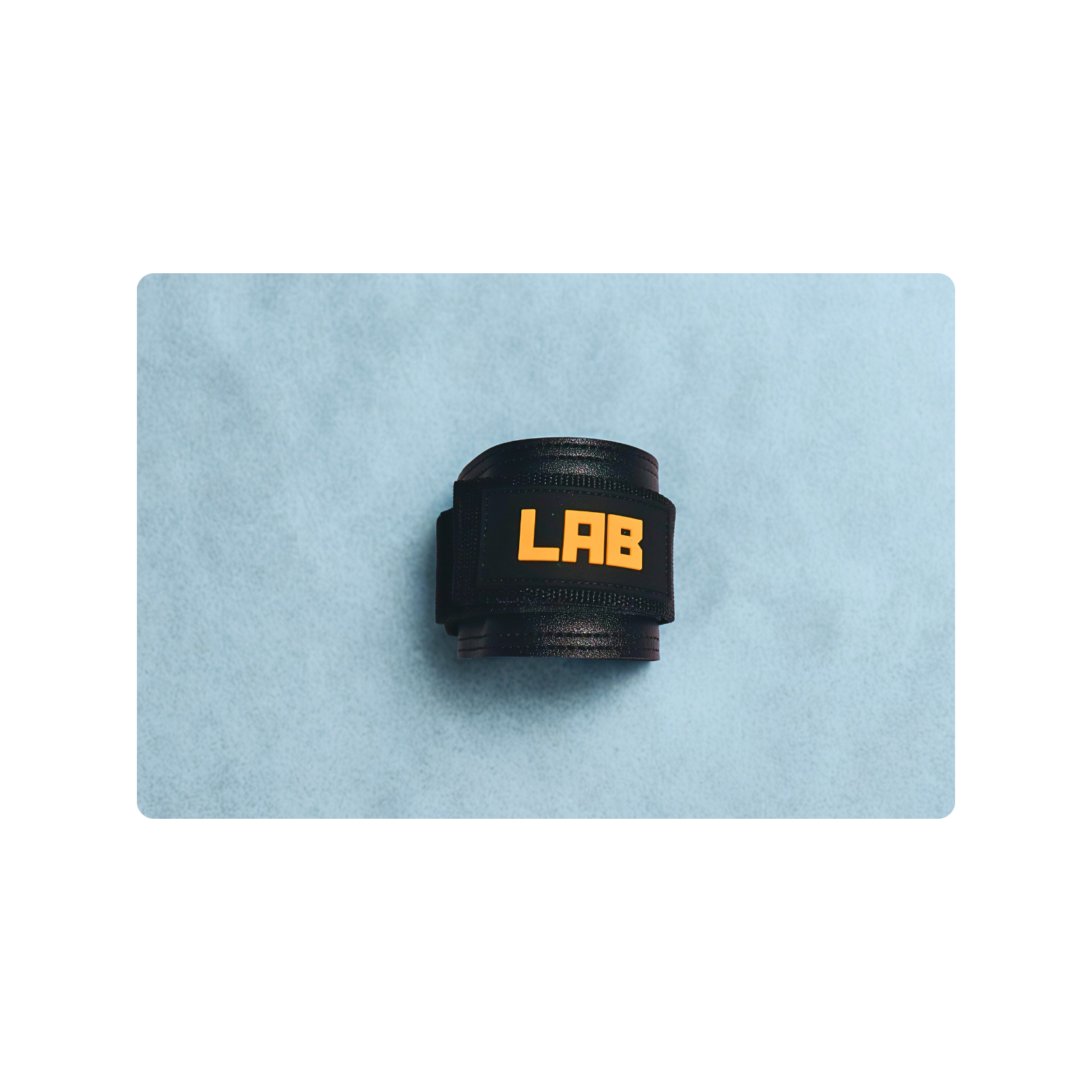 Black LABORATORY ANKLE STRAP with 'LAB' branding on a light blue background