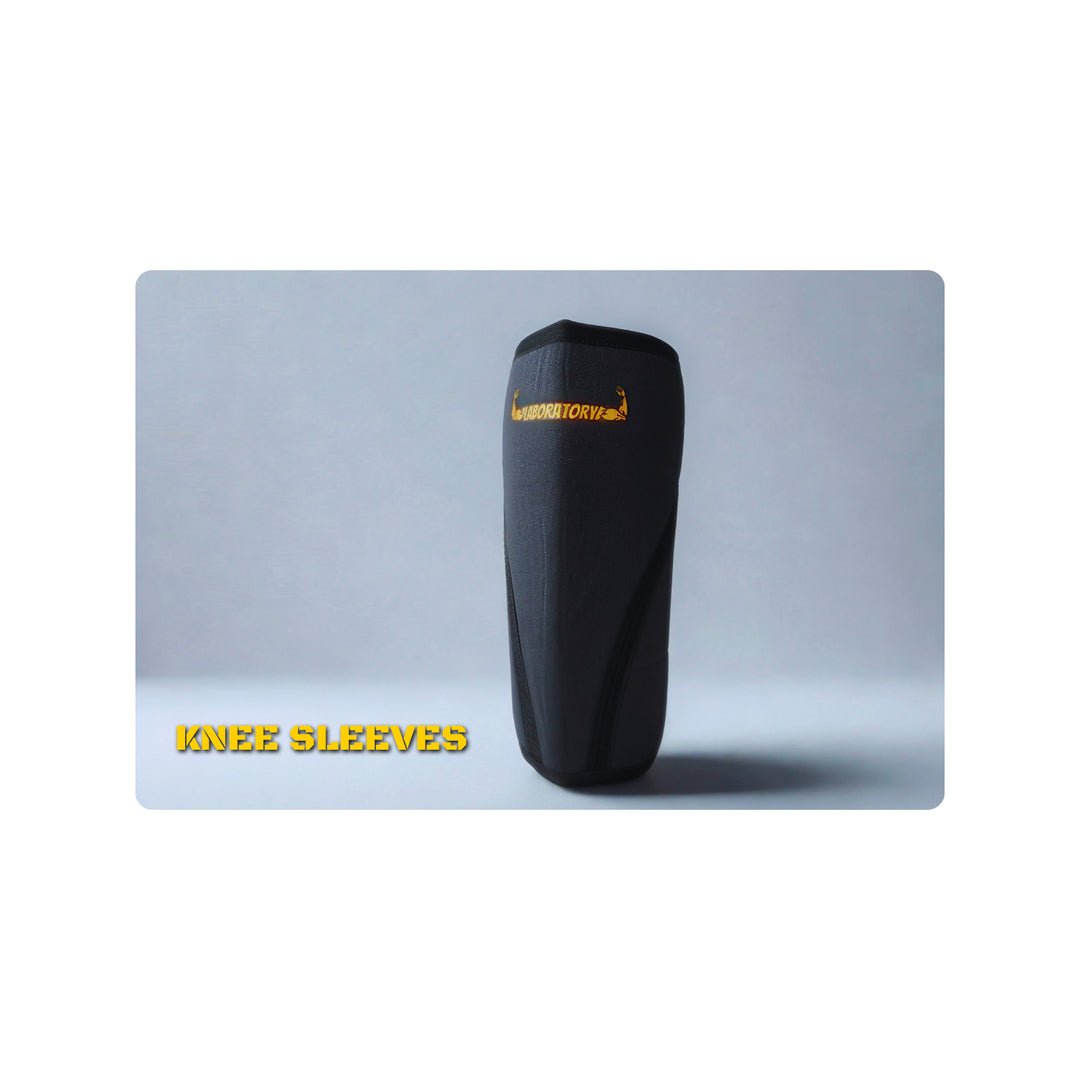 Black LABORATORY knee sleeve with yellow text on a gray background