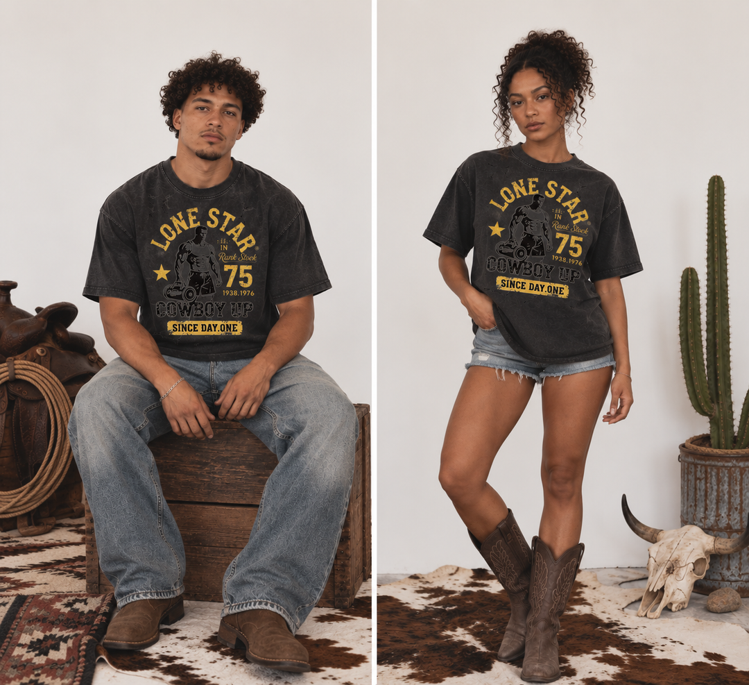 A split-screen lifestyle image showing a man and a woman wearing matching dark gray graphic t-shirts with a western 'Lone Star 75' design. The man is seated on a wooden crate wearing blue jeans and brown boots, while the woman stands in denim shorts and brown cowboy boots.