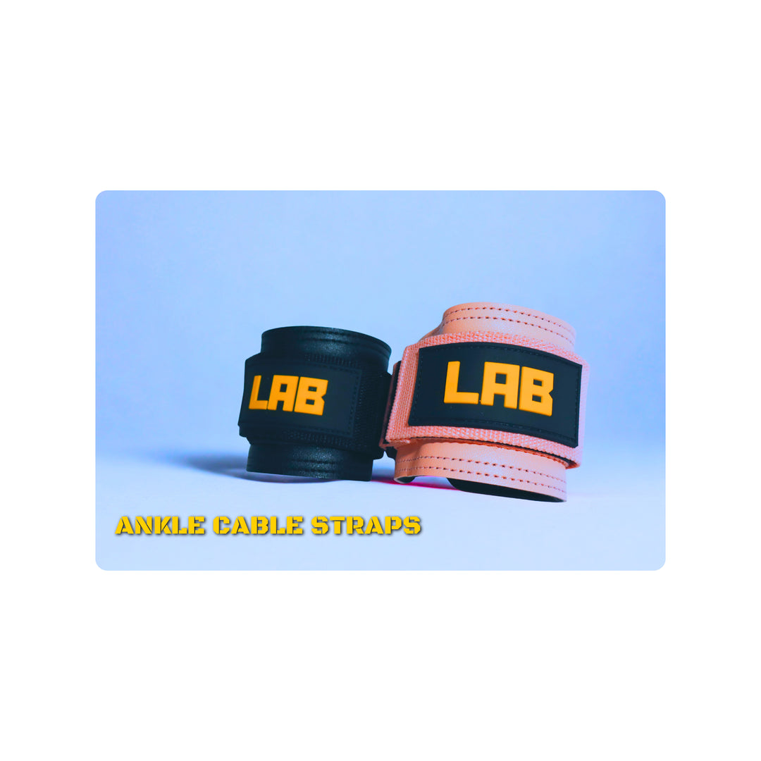 Black and pink ankle cable straps with 'LAB' branding on a light blue background