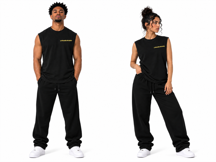 A man and a woman modeling matching black sleeveless muscle t-shirts and sweatpants sets against a plain white background. The shirts feature a small yellow 'Laboratory' logo on the left chest.