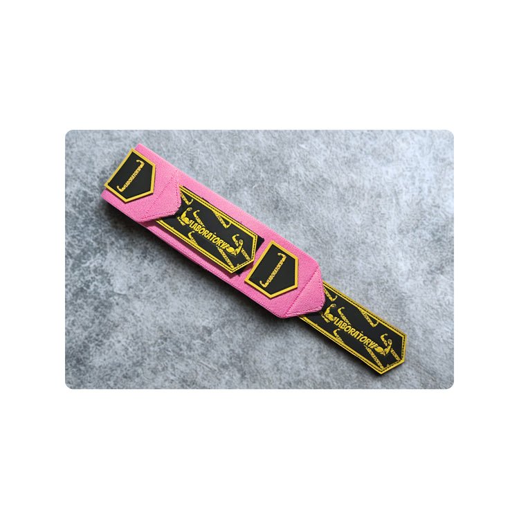 Laboratory pink wrist wraps V2 on gray surface