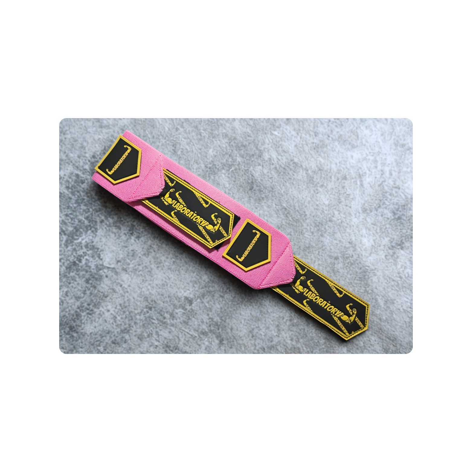 Laboratory pink wrist wraps V2 on gray surface