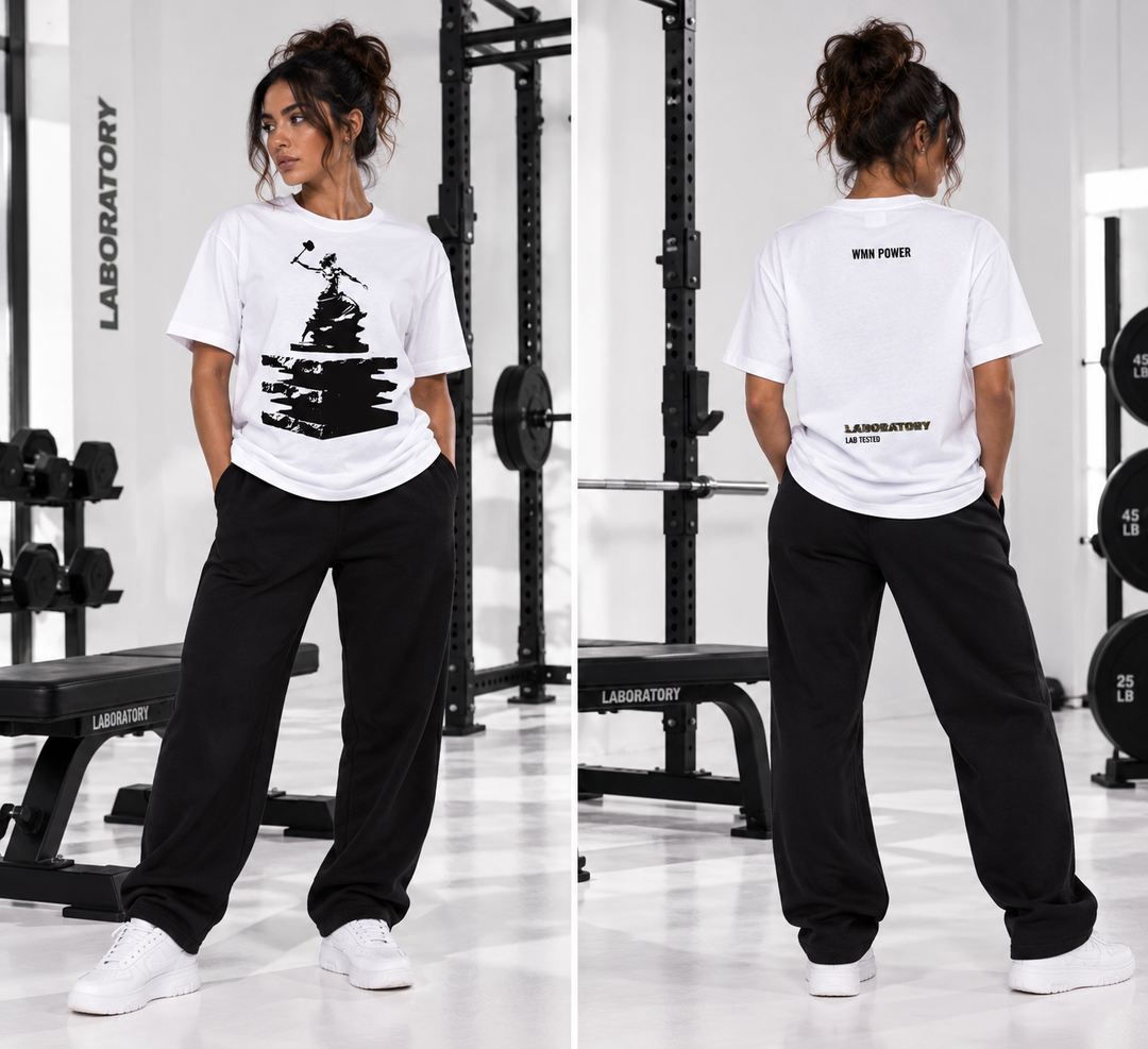 A woman modeling a white graphic T-shirt and black sweatpants in a gym setting, shown from both front and back views in a side-by-side collage. The gym features weight racks and benches.
