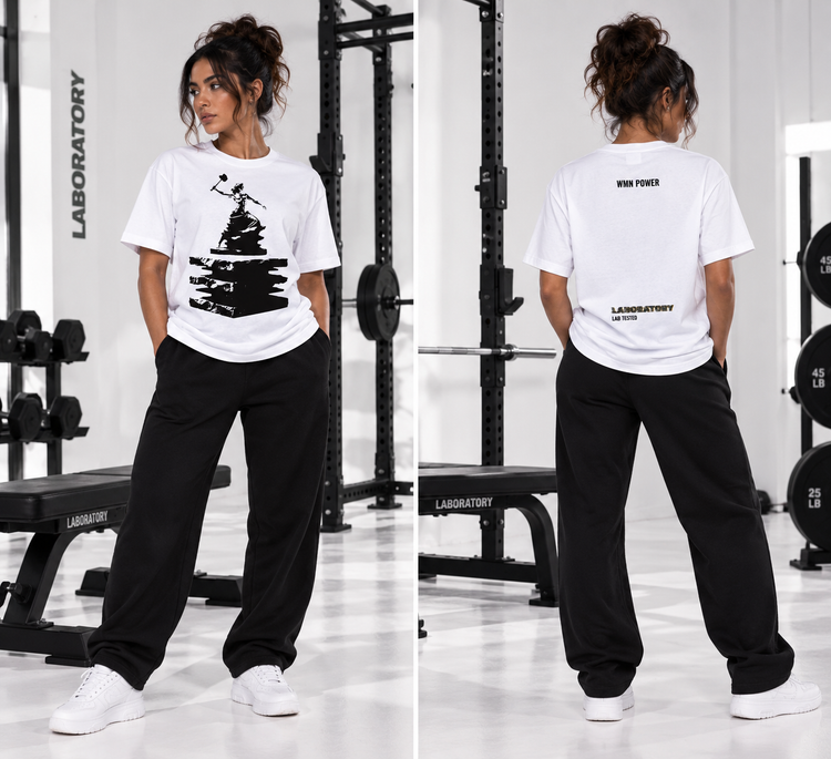 A woman modeling a white graphic T-shirt and black sweatpants in a gym setting, shown from both front and back views in a side-by-side collage. The gym features weight racks and benches.
