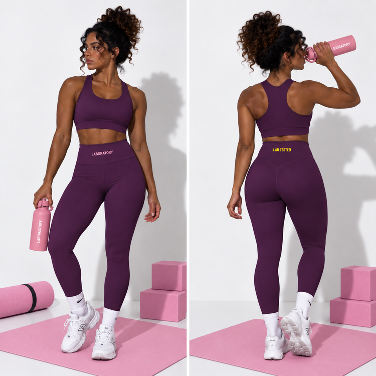 A woman modeling a matching athletic set in two side-by-side views. The set includes a dark purple sports bra and high-waisted leggings with 'LAB OTELLO' printed in gold on the waistbands.