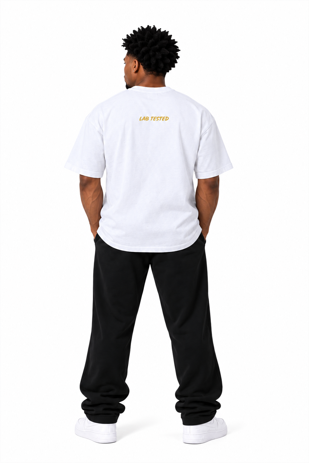 A man viewed from behind wearing a white t-shirt with 'LAN TISTED.' printed in yellow on the back, paired with black sweatpants and white sneakers, against a plain white background.