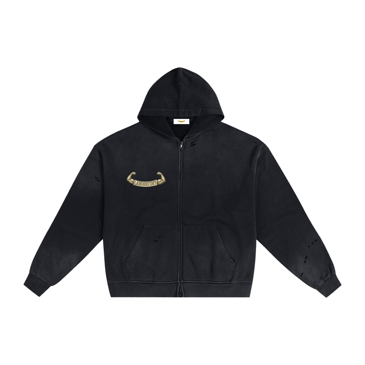 A black distressed zip-up hoodie with a small gold graphic on the left chest, displayed flat against a solid white background.