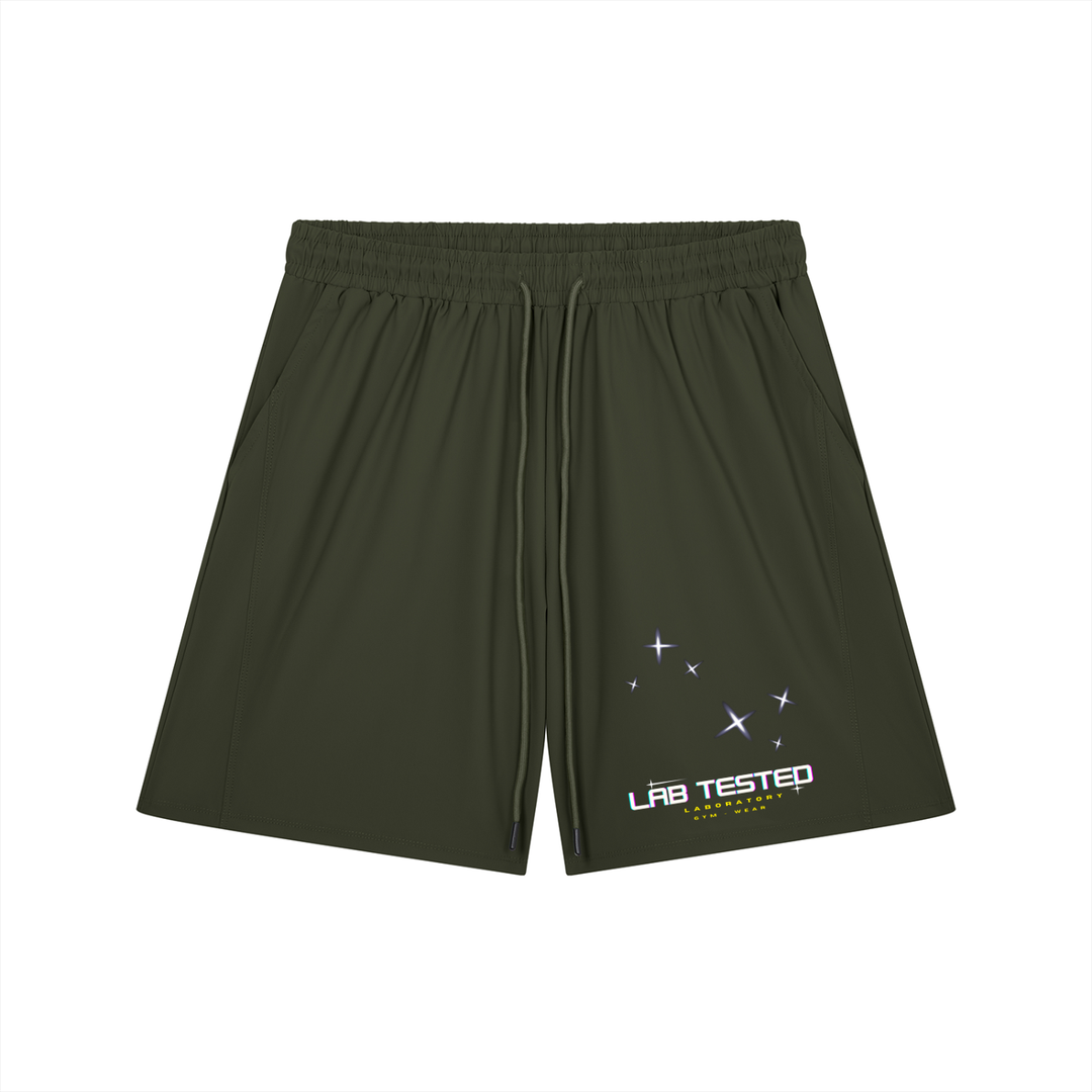 Green shorts with a lab tested logo on a white background