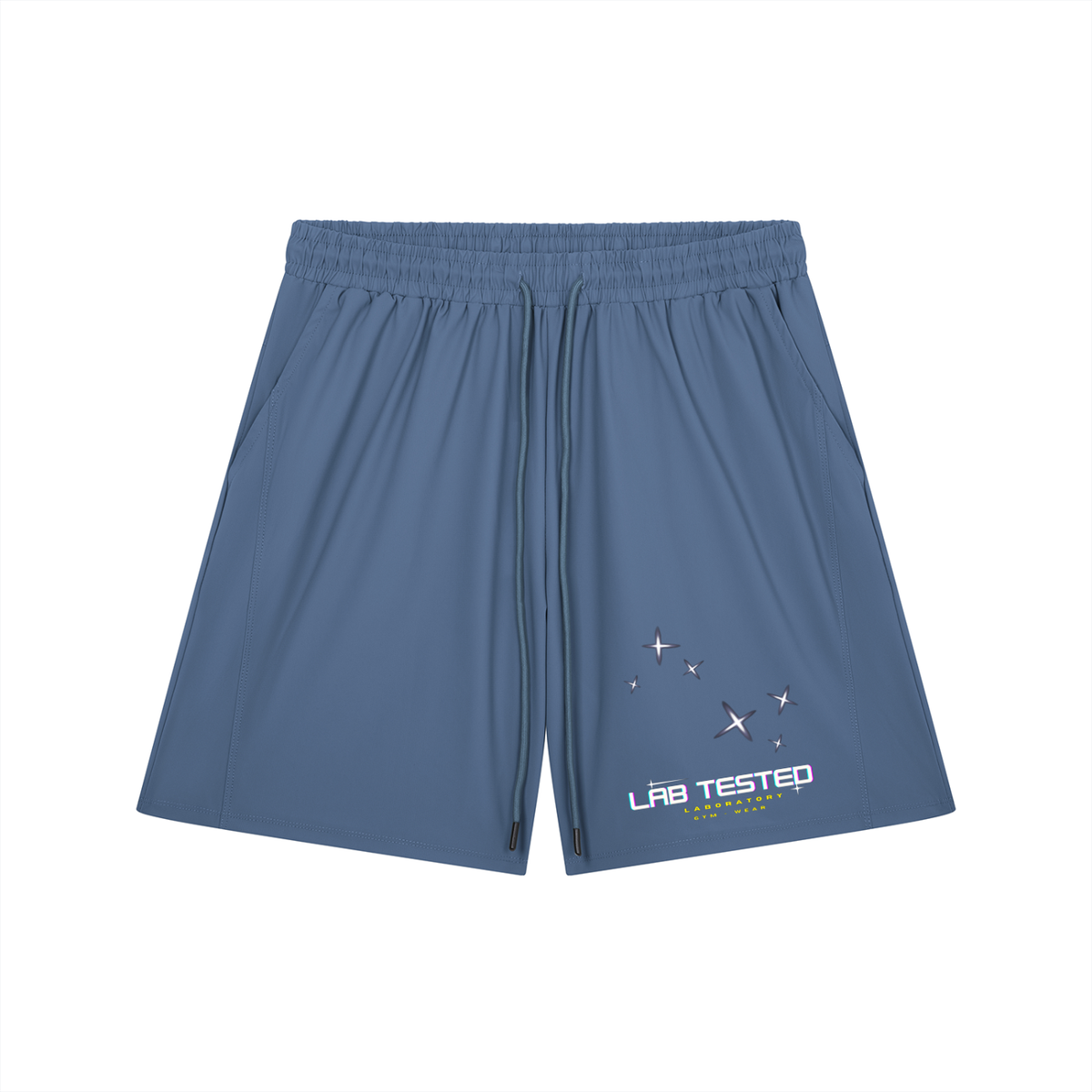 A pair of slate blue athletic shorts with an elastic waistband and drawstring, featuring a white and yellow 'LAB TESTED' graphic with stars on the lower left leg, shown against a plain white background.